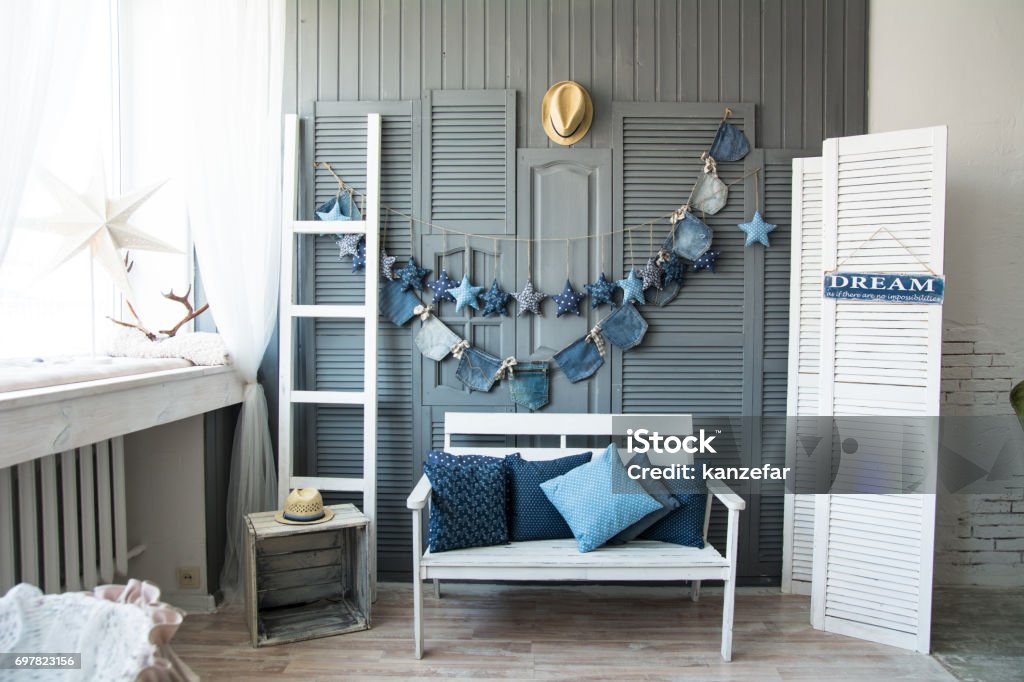 Interior wall with bench Interior wall with bench and decorations of jeans. Designed in the style of jeans Abstract Stock Photo