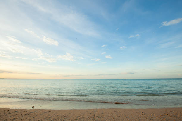 istock Wave of the sea on the sand beach 697826540