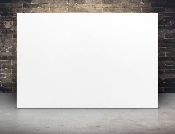 istock Blank white paper poster at grunge brick wall and concrete floor,Mock up template for adding your content or design,Business presentation 697827238