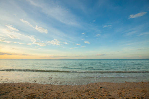 istock Wave of the sea on the sand beach 697827316