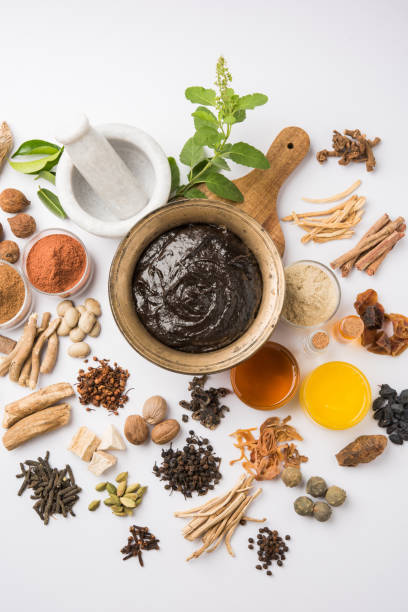 istock Indian Ayurvedic dietary supplement called Chyawanprash / chyavanaprasha  is a cooked mixture of sugar, honey, ghee, Indian Gooseberry (amla), jam, sesame oil, berries, herbs and various spices 697828358