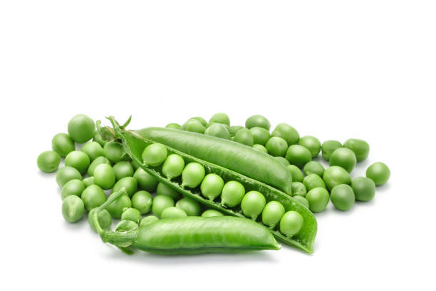 istock Ripe green peas on a white background. An isolated object 697833872