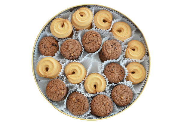 istock vanilla and chocolate cookies in circle tin box 697834548