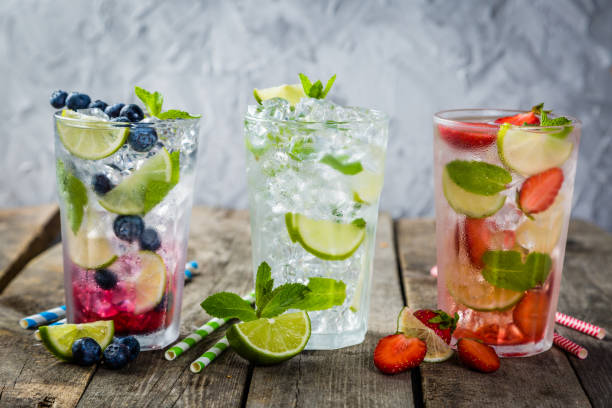 istock Selection of colorful mojitoes in glasses 697838048