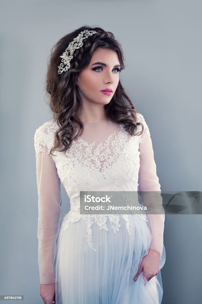 Beautiful Young Woman Wearing Evening Gown Perfect Bride With Bridal Hairstyle Event Makeup And Jewelry Stock Photo - Download Image Now - iStock Beautiful Young Woman Wearing Evening Gown Perfect Bride With Bridal Hairstyle Event Makeup And Jewelry Stock Photo - Download Image Now - iStock