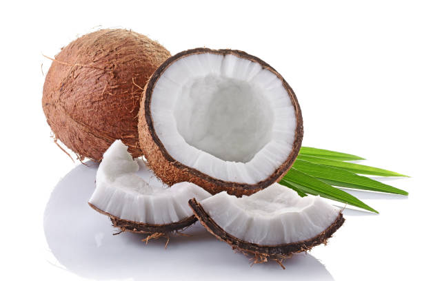 istock Fresh coconut with green palm leaves 697845174