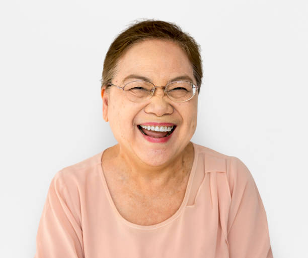 istock Happiness woman smiling casual studio portrait 697849154