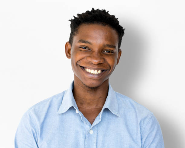 istock Happiness african man smiling studio portrait 697849556