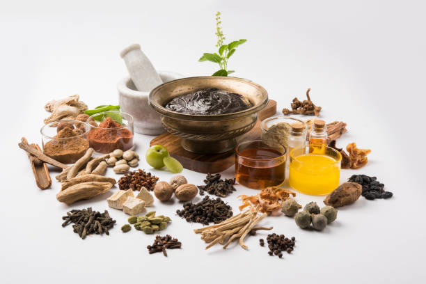 istock Indian Ayurvedic dietary supplement called Chyawanprash / chyavanaprasha  is a cooked mixture of sugar, honey, ghee, Indian Gooseberry (amla), jam, sesame oil, berries, herbs and various spices 697850130