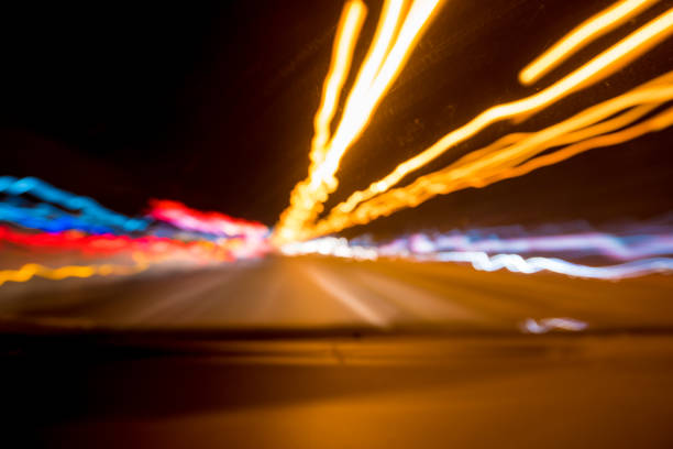 istock abstract speed background, car lights on the way 697850196