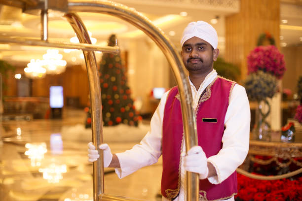 istock young asian porter with cart 697860226