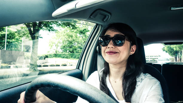 istock Woman driving a car 697860454
