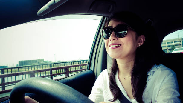 istock Woman driving a car 697863522