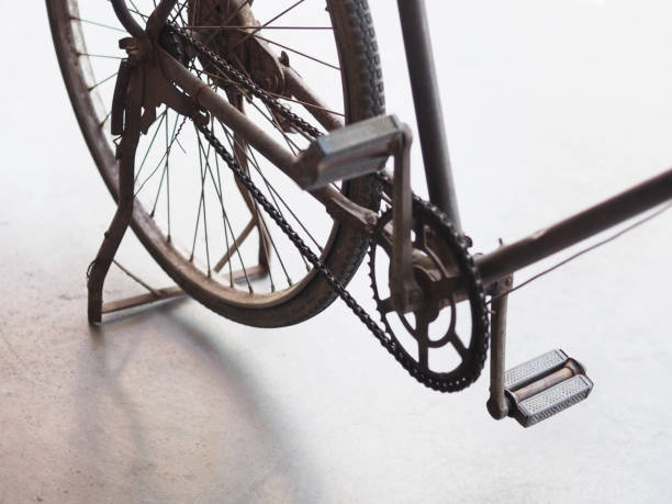 Close up back wheel of old bicycle parking