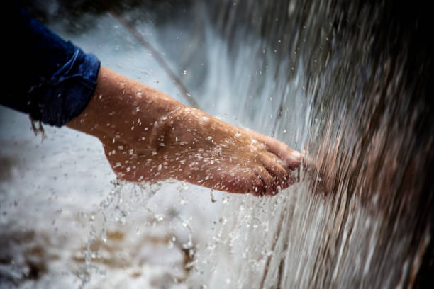 Human toes makes ntural water spray
