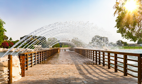 Bridge with fountain in the Aspire park in Doha, Qatar