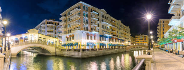 The Qanat Quartier on the Pearl Island in Doha, Qatar, by night