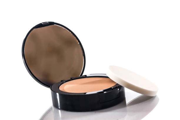 istock Make-up face powder isolated on white background 697875126