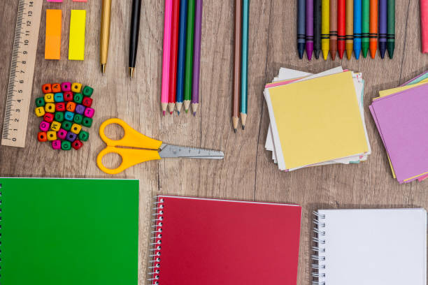 istock many different school supplies on wooden background 697875676