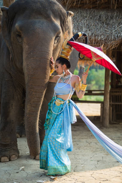 istock Thai Woman In Traditional Costume 697878546