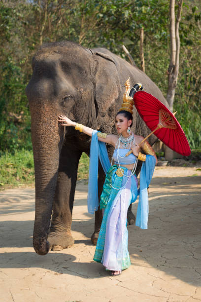 istock Thai Woman In Traditional Costume 697884072