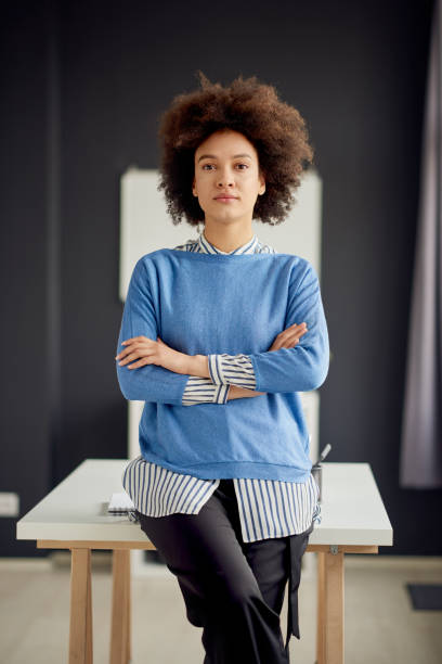 istock Business people in modern office 697884236