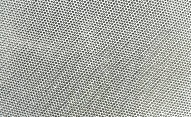 istock Metallic mesh part of microphone. 697886958