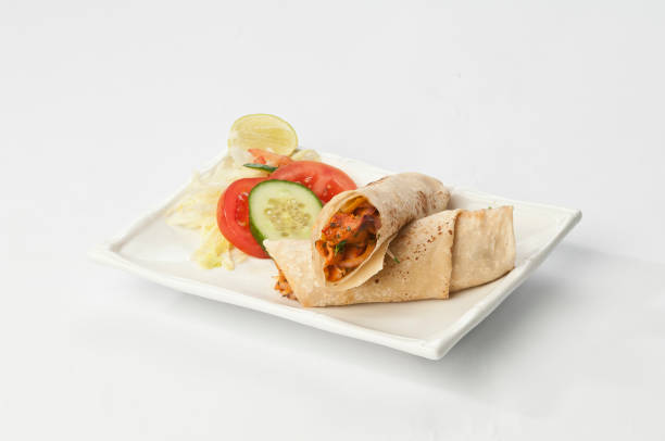 istock chicken kathi rolls with fresh salad and green chilly 697887542
