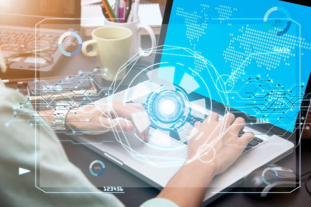 istock business hand typing on computer keyboard with future technology cyberspace inerface on screen. 697888666