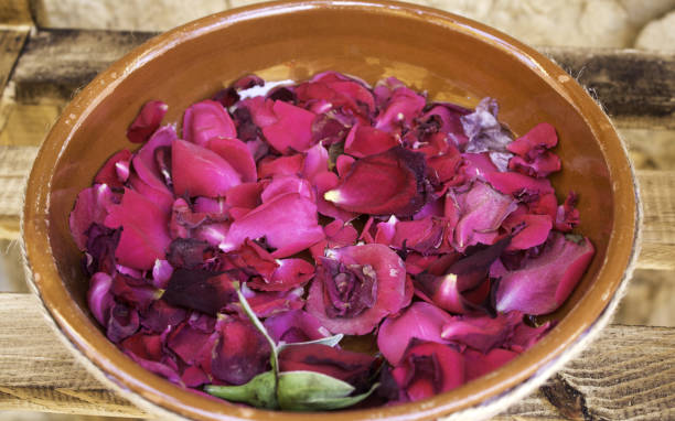 istock Petals of rose in bowl 697901336