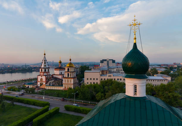 istock Cityscape with orthodox church at sunset 697912812