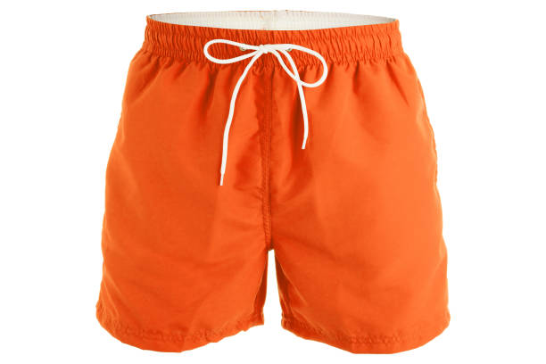 shorts hommes orange pour la baignade - short photos et images de collection