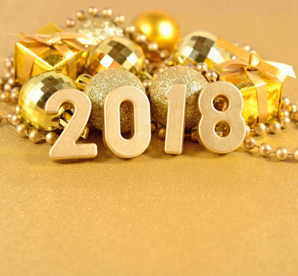 istock 2018 year golden figures and Christmas decorations 697920580