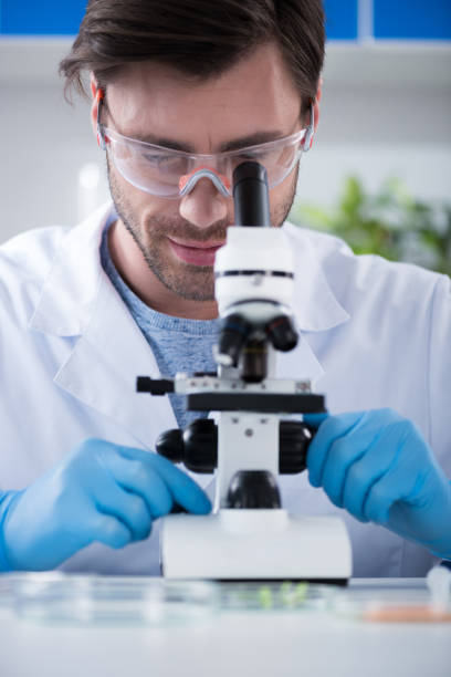 istock Male scientist during work at modern biological laboratory 697931936