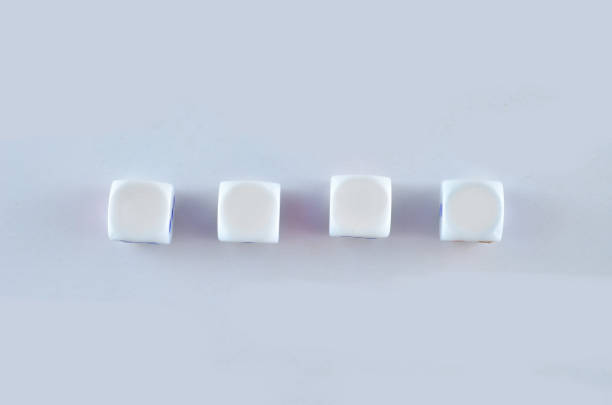 istock Group of White dice over white background with space for text 697936704