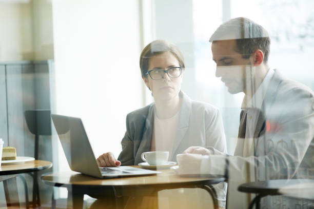 istock Business People Working at Coffee Break 697940592