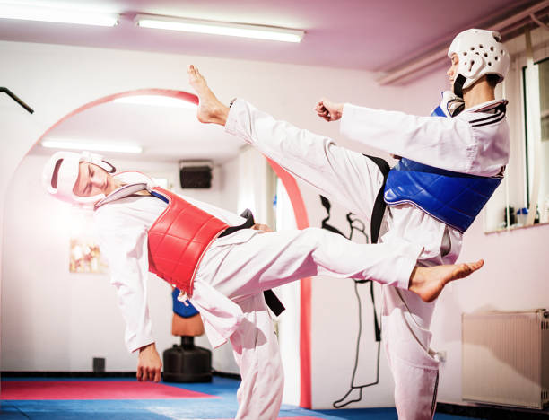 istock Match between trainer and trainee in taekwondo 697946014