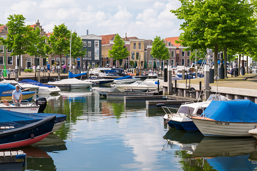 People and boats in marina of old town of Oud-Beijerland, Hoeksche Waard, South Holland, Netherlands