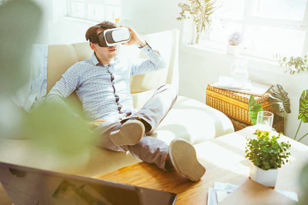 istock The man with glasses of virtual reality. Future technology concept 697952880