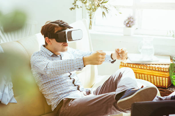 istock The man with glasses of virtual reality. Future technology concept 697956936