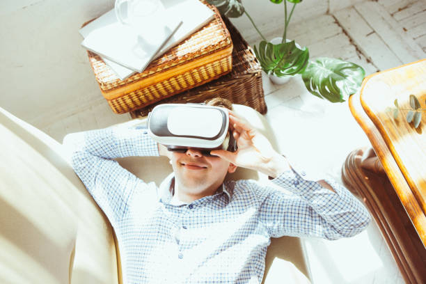 istock The man with glasses of virtual reality. Future technology concept 697959460