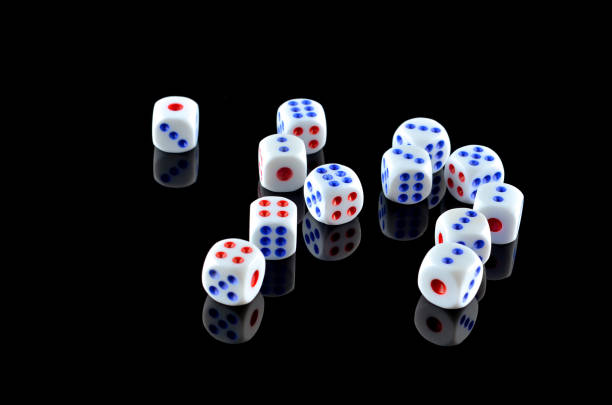 istock Group of White dice over black background 697960664