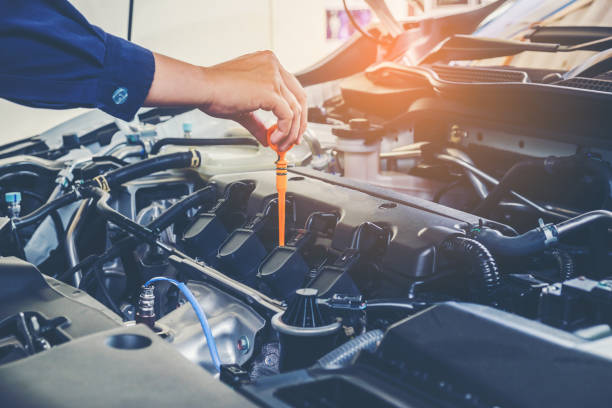 istock Car mechanic working in auto repair service 697961100