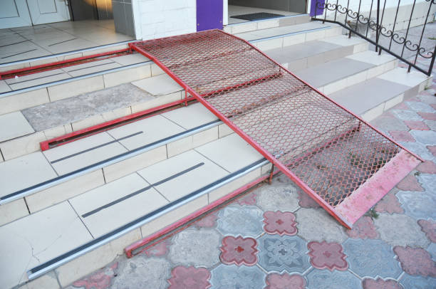 istock Metal ramp for wheelchair entry and steps. 697963658
