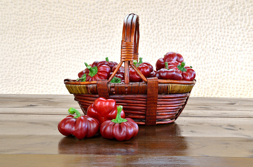 Red Topepo Rosso peppers on a basket