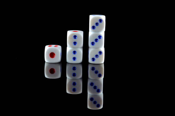 istock Group of White dice over black background 697967200