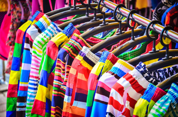 istock Colorful Pants hanging on a rack 697967304