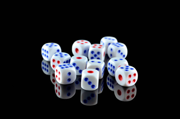 istock Group of White dice over black background 697972072