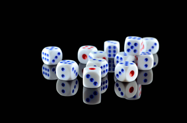 istock Group of White dice over black background 697974672