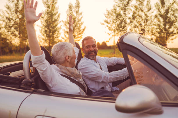 istock Mature couple at car 697975136